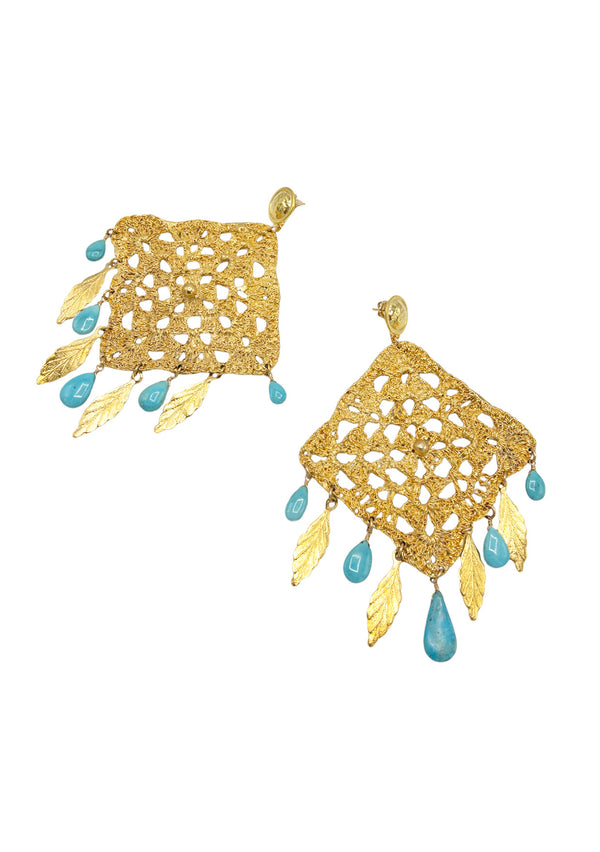 Bohemian gold trellis statement earrings with turquoise drops and gold leaf details.  We're wearing these beautiful fall statement earrings with a cozy sweater and Gigi Pip hat.