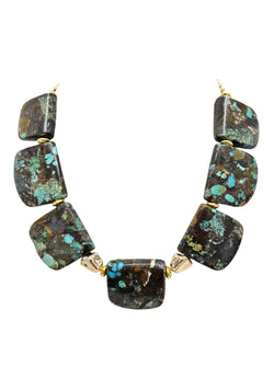Inspired by the many colors of the sea, this oversize blue, green, and brown natural turquoise and jasper slab necklace feels weighted and luxurious, exuding brilliance and depth. Discover this and more at www.devonleighdesigns.com - Handmade in the USA.