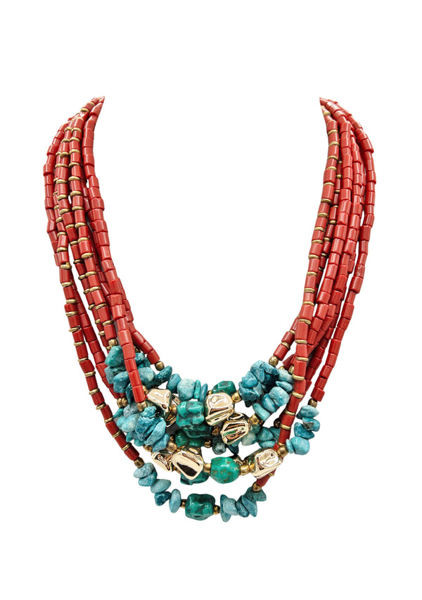 This Red Coral Turquoise Gold Bohemian Necklace adds a touch of luxe boho chic to any look. Crafted in the USA with 18K gold plated accent beads and a 14K gold filled chain and clasp, its adjustable length of 17.5-19.5" makes it endlessly versatile. Wear it to add a polished, elegant statement that exudes confidents and resilience. 