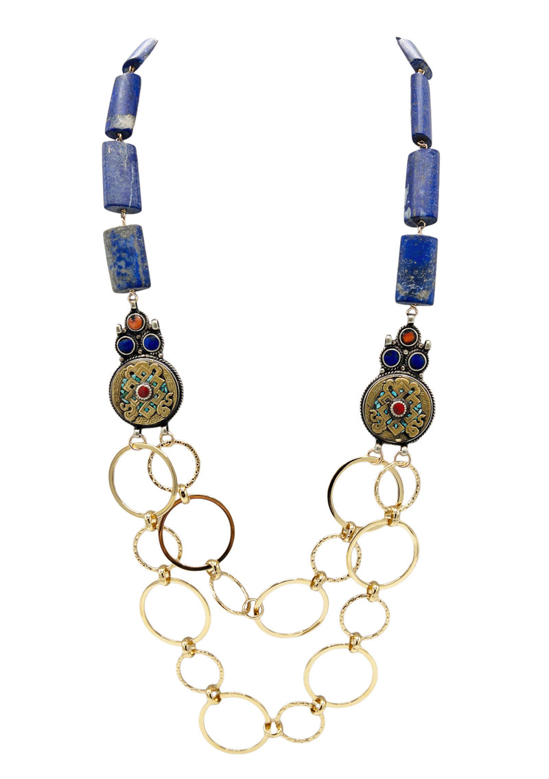 Captivating and stunning, The Goddess Denim Blue Lapis Chain Necklace is the perfect statement piece. Featuring a faceted blue lapis stone, elegantly suspended from intricate gold loop chains alongside luxe antique brass and turquoise Nepalese medallions, this timeless necklace will surely add a touch of the divine to any ensemble. Inspired by ancient Greek Goddesses, this necklace will bring a touch of class to any look.