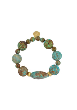 Devon Leigh Hand-carved, genuine turquoise beaded stretch bracelet is elegant and chic, with two 18K gold African bead accents. 